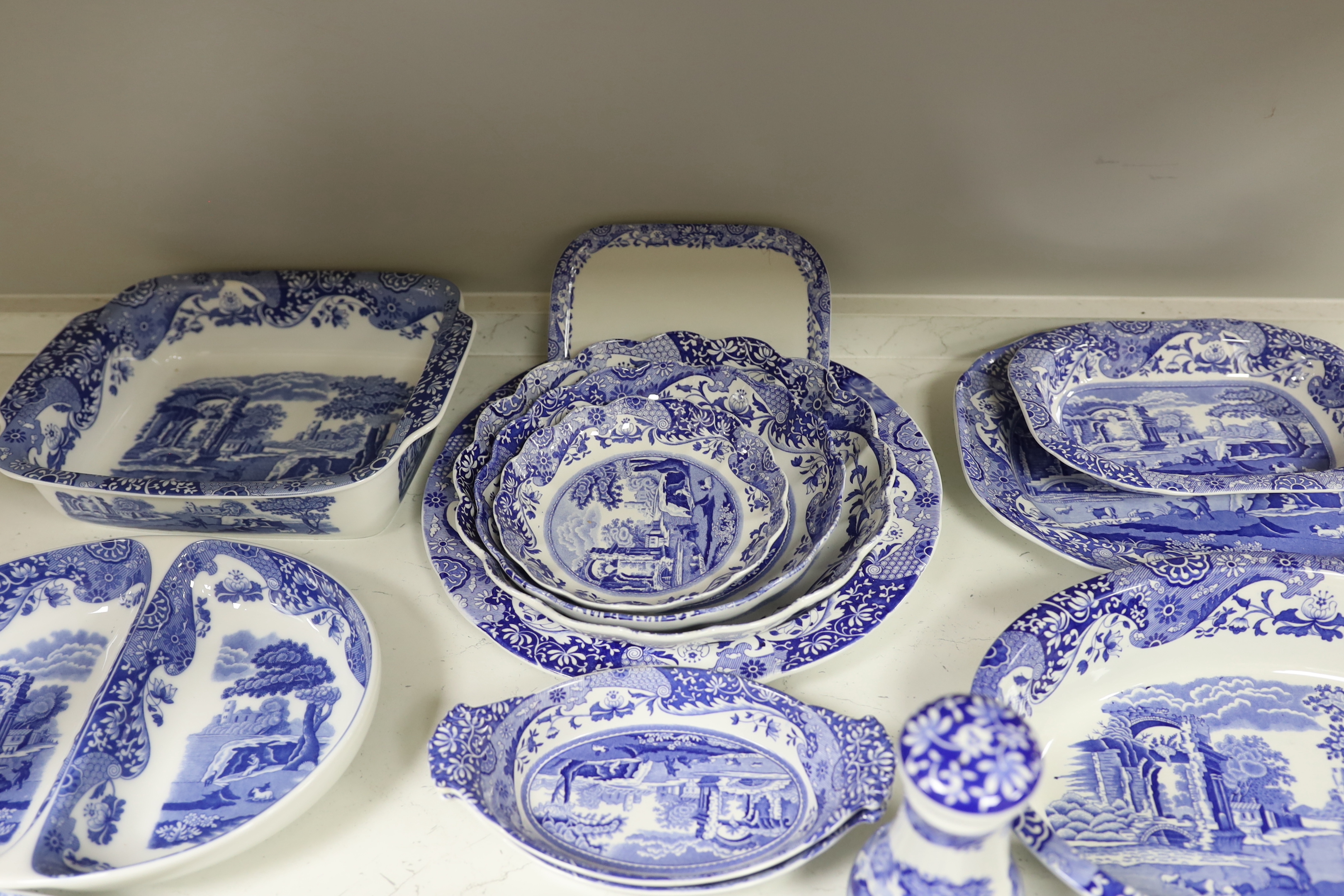 A collection of Spode Italian blue and white various sized serving dishes, cruets etc